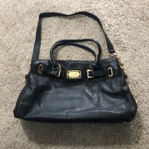 Black leather Michael Kors bag with rhinestone tag